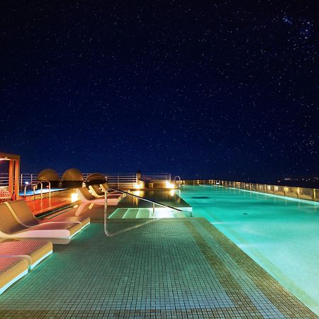 Kensington Jeju Hotel Eksteriør billede Rooftop pool at the hotel